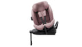 Pink and black car seat on a white background